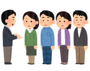 上司が４人に説明しているイラスト