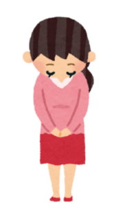 おじぎをしている女性